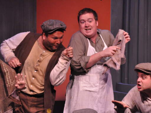 Philip Farugia as Doolittle along with Kevin R. Kennedy and Kevin Craig