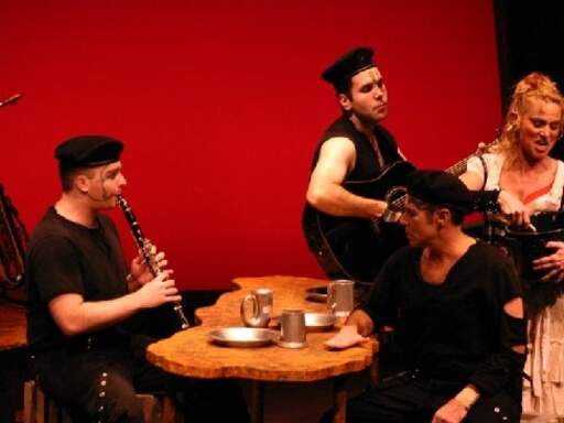 Casey Denton, Paschal Frisina III and Robert &quot;Ernie&quot; Insana as Muleteers with Lisa Ludwig as Aldonza
