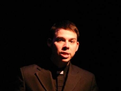 Marc Sacco as the Priest